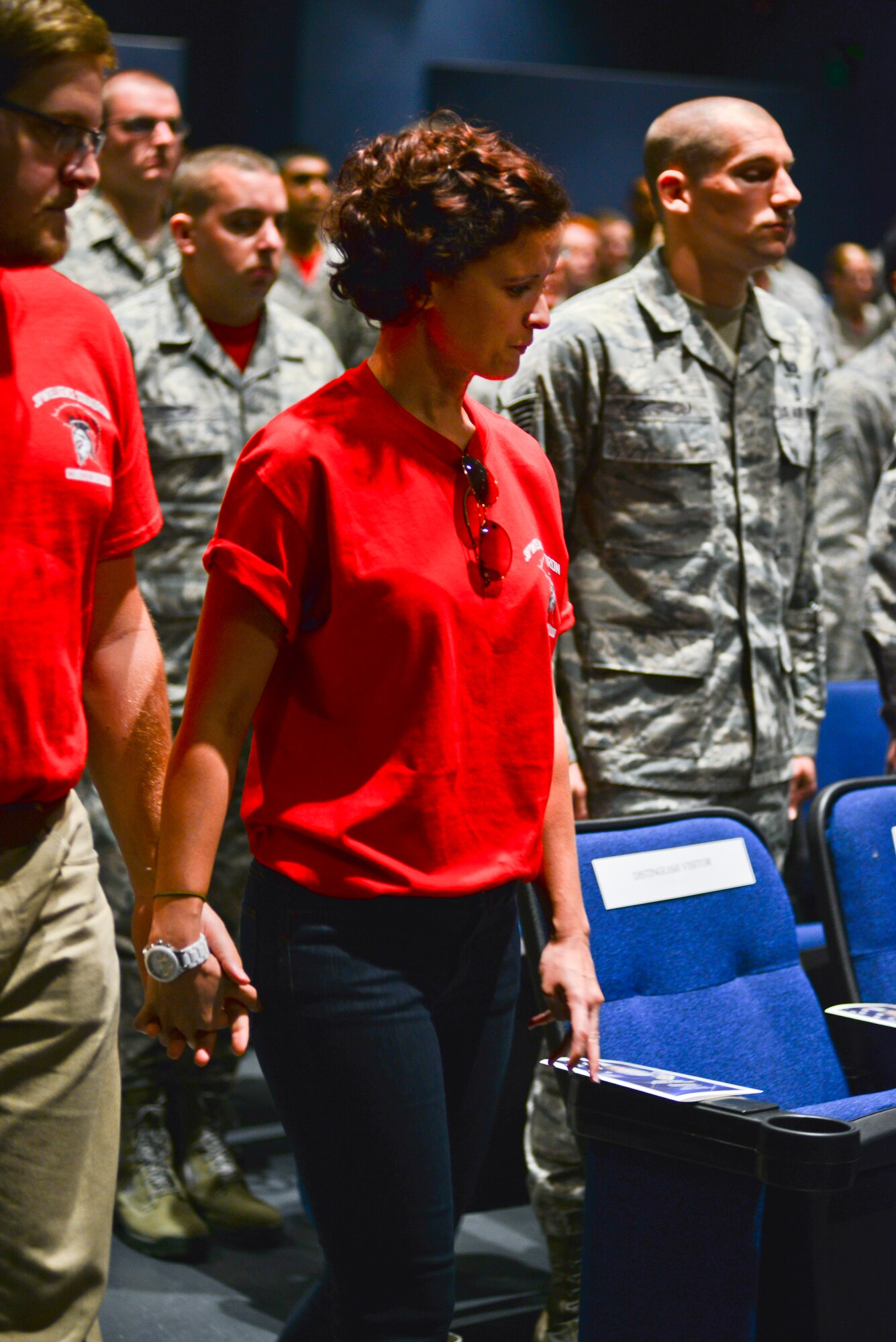 The family members of Senior Airman Russell Mountain, a former 30th Intelligence Squadron analyst, arrive at a memorial ceremony on Langley Air Force Base, Va., Sept. 19, 2014. Mountain passed away from a motorcycle accident August 22. His family said they remember Mountain as a confident, warm and caring man who faced life head-on. (U.S. Air Force photo by Senior Airman Aubrey White/Released)