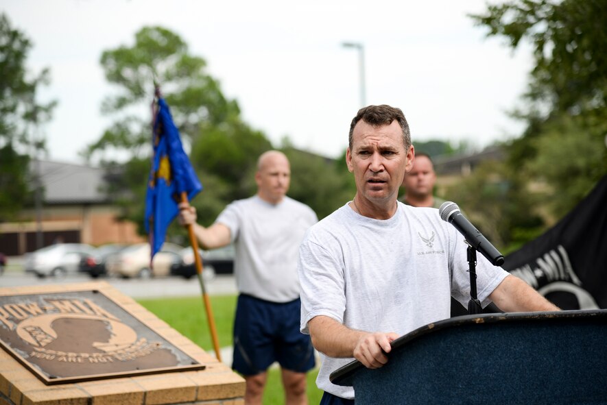 U.S Air Force Col. Chad Franks, 23d Wing commander, gives closing remarks at the end of the Tiger-thon run, Sept. 19, 2014, at Moody Air Force Base, Ga. Franks told participants that given the base’s search and rescue mission, the Tiger-thon serves as a reminder of why Team Moody trains and works hard every day. (U.S. Air Force photo by Senior Airman Sandra Marrero/Released)
