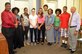 U.S. Army Col. Glenda J. Lock, McDonald Army Health Center commander, and Red Cross youth volunteer program staff members recognize the 2014 Summer Youth Volunteer Program participants, Aug. 15, 2014. During the summer program, volunteers filled positions in various clinics and departments in the health center to gain experience working in the medical field and to learn about leadership and community service. (Courtesy photo)