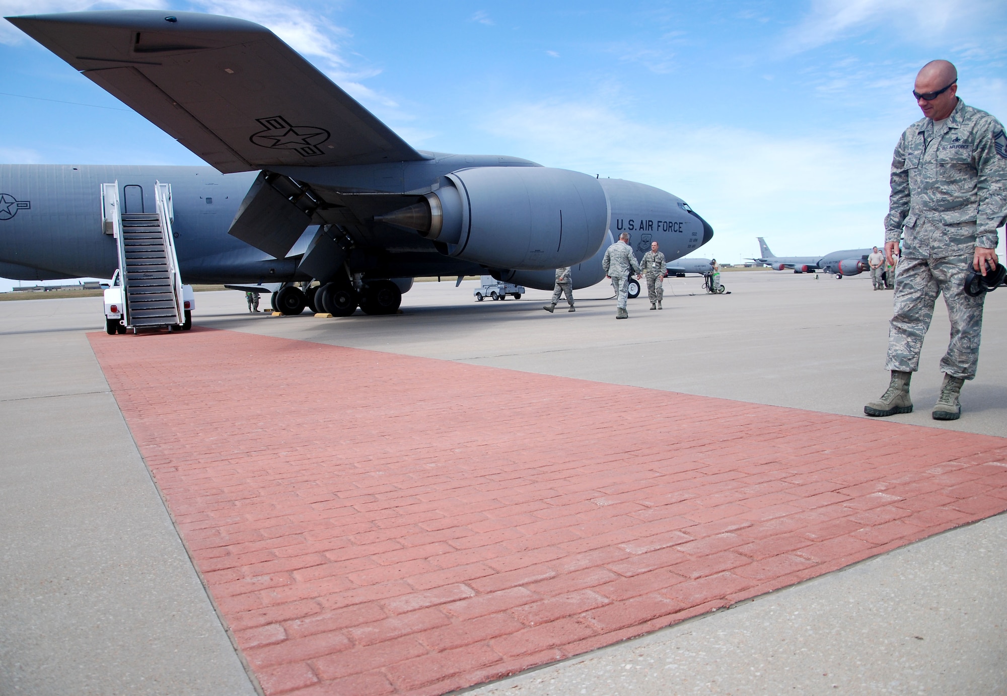 Senior Master Sgt. Willie Tucker, 931st Aircraft Maintenance Squadron first sergeant, helps prepare the flightline for returning Air Force Reservists at McConnell Air Force Base, Kan., Sept. 22, 2014.  During the deployment, members of the 931 ARG performed aircraft maintenance and filled other support roles while assigned to the 379th Air Expeditionary Wing. (U.S. Air Force photos by Staff Sgt. Abigail Klein)
 
