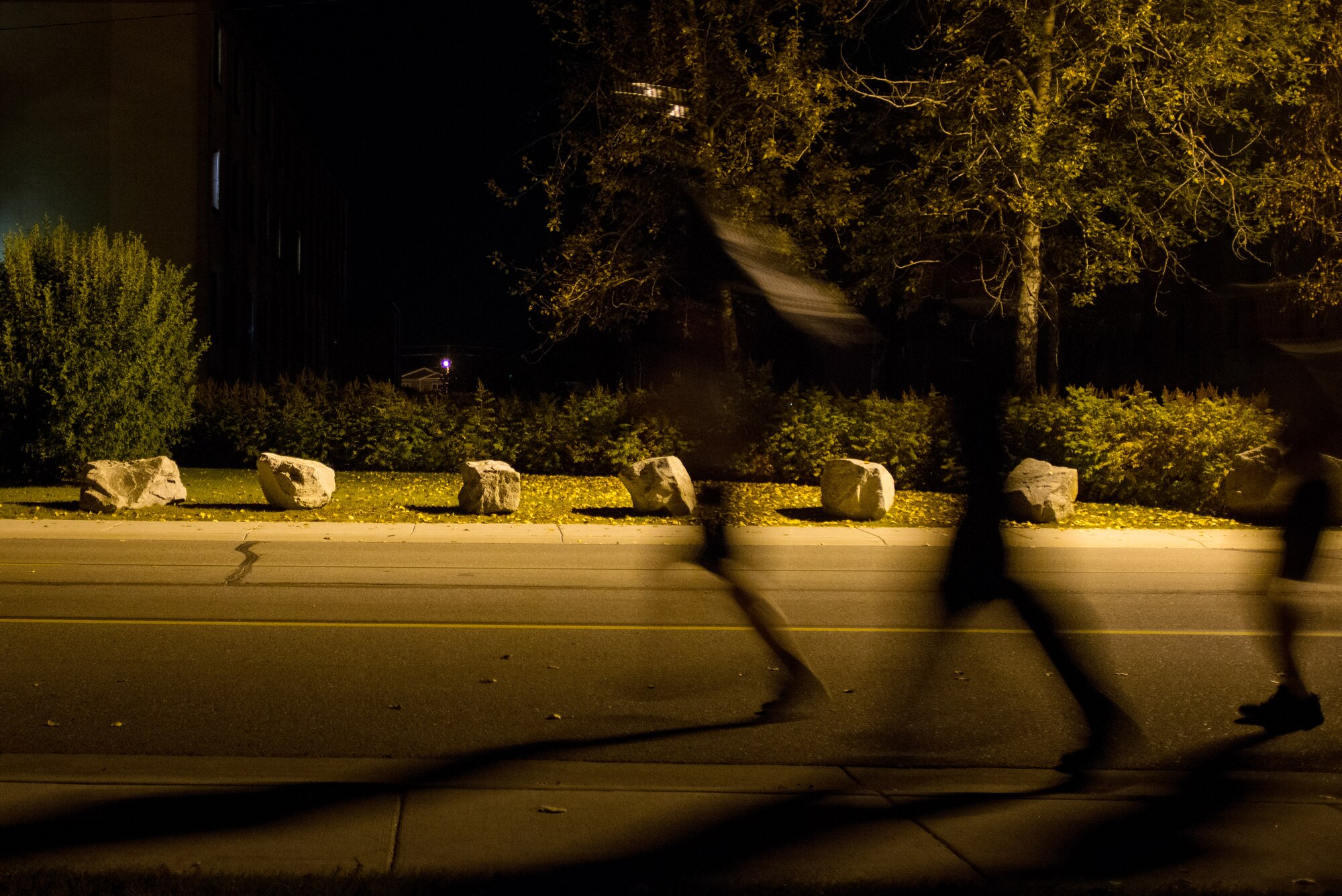 U.S. Airmen participate in a POW/MIA 24-hour vigil run during National POW/MIA Recognition Day at Eielson Air Force Base, Alaska, Sept. 18, 2014.  The third Friday of September each year is observed across the United States as National POW/MIA Recognition Day to honor prisoners of war and the missing as well as their families and highlights the government's commitment to account for them. (U.S. Air Force photo by Tech. Sgt. Joseph Swafford/Released)
