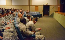 Team Malmstrom members listen to retired Lt. Jason Redman, U.S. Navy SEAL, as he speaks about teamwork, camaraderie and courage in the face of danger during an all call at Malmstrom Air Force Base’s auditorium Sept. 18. Throughout the day, Redman toured the base and spoke with Airmen at various locations about his career as a Navy SEAL.
