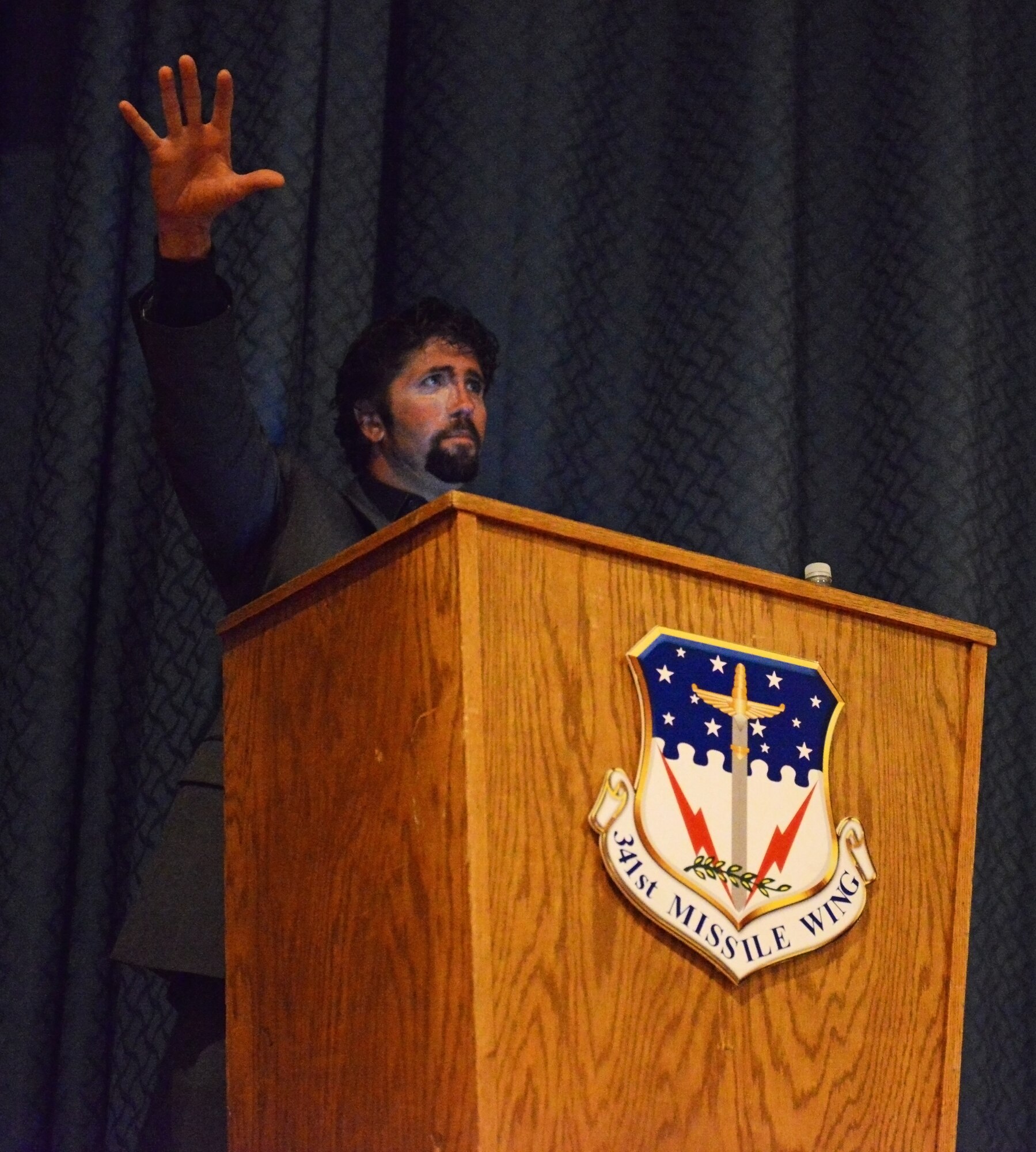 Retired Lt. Jason Redman, U.S. Navy SEAL, shares his story during an all call at Malmstrom Air Force Base’s auditorium Sept. 18. During the all call, Redman explained some experiences he overcame over the course of his 21-year career while serving as a Navy SEAL. (U.S. Air Force photo/Airman 1st Class Collin Schmidt)  