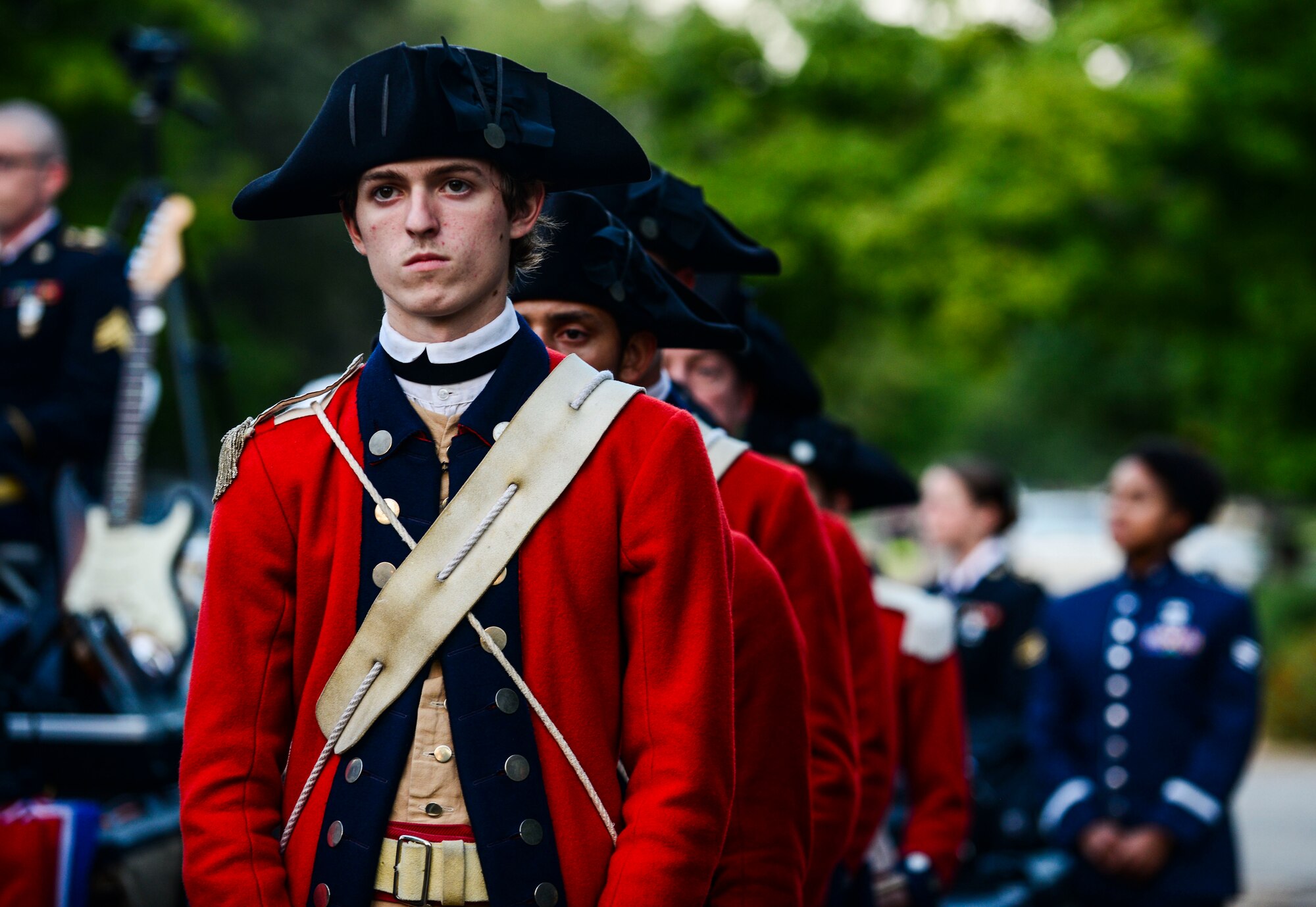 The Fifes and Drums Corps of Colonial Williamsburg await their turn to perform during the Constitution Day “Support and Defend” concert in Williamsburg, Va., Sept 17, 2014. The corps carries forward the tradition of military music while appearing at more than 700 performances each year.(U.S. Air Force photo by Airman 1st Class Kimberly Nagle/Released)