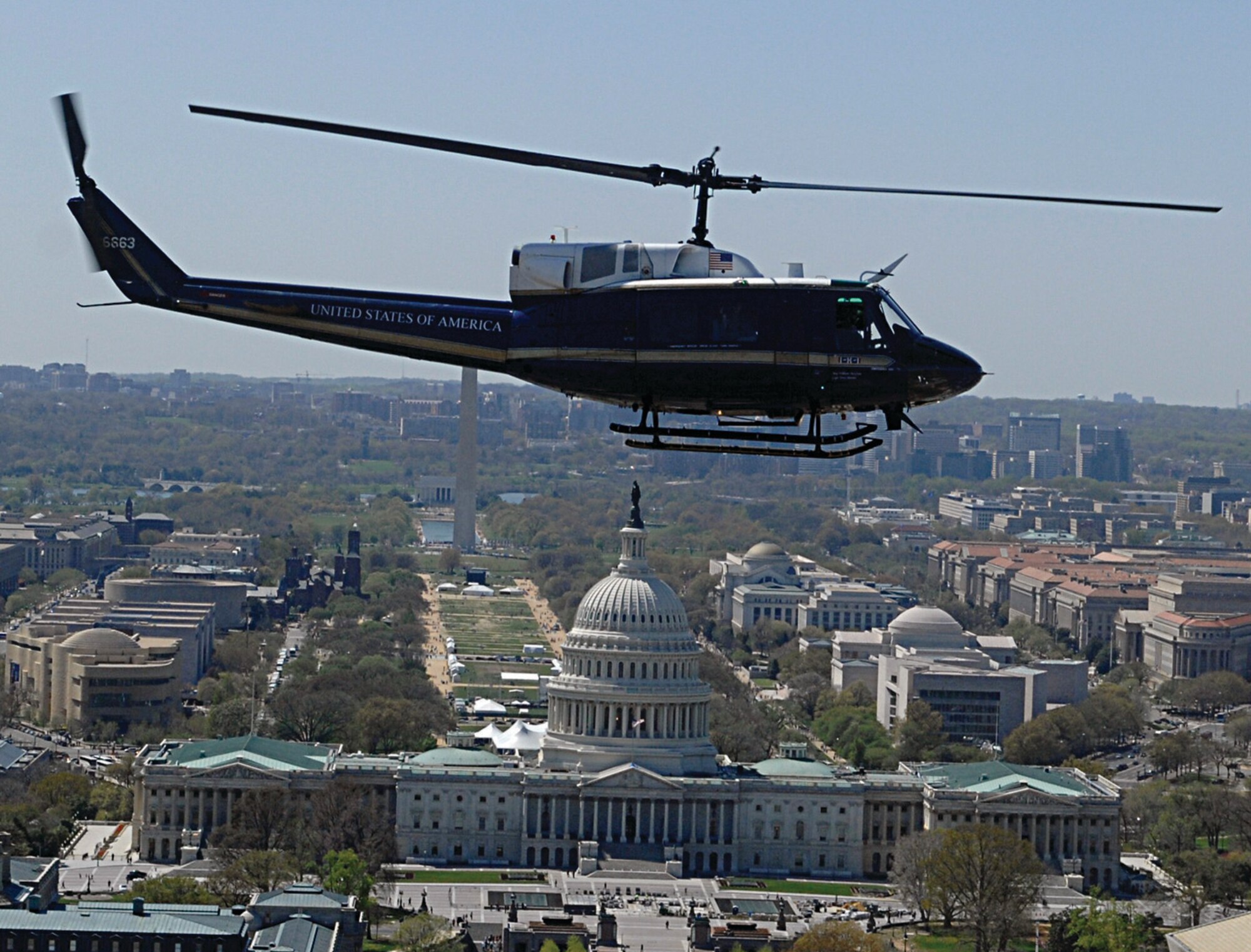 A 1st Helicopter Squadron UH-1N Huey flies by the U.S. Capitol in Washington D.C. on May 8, 2009. Contingency response is just one of Air Force District of Washington’s core mission sets, which also includes ceremonial honors and operational support.  The command reactivated in 2005 to address three broad objectives: to align the Air Force command structure in the NCR with its sister services; to improve Air Force support to the Joint Force Headquarters-National Capital Region; and to designate a single voice for Air Force cross-service issues in the NCR. (U.S. Air Force photo/ Airman 1st Class Melissa Rodrigues)