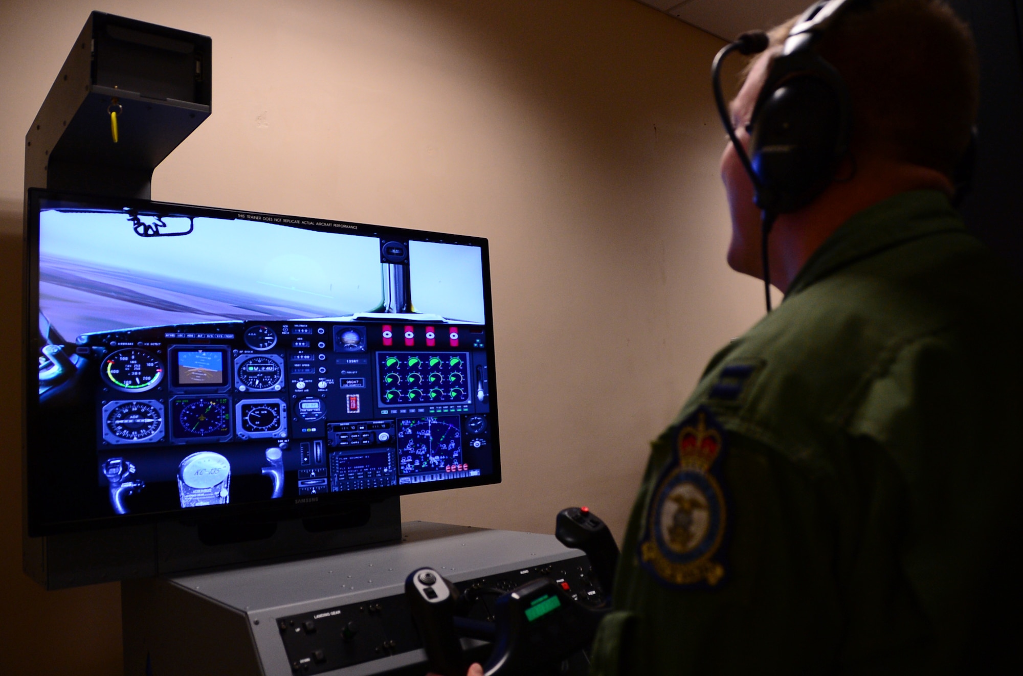 Capt. David Cox, 100th Operations Group training assistant chief, undergoes simulated hypoxia training at Royal Air Force Lakenheath, England, Sept. 17, 2014.  As part of a safety requirement, aircrew attend hypoxia refresher training every five years to become re-introduced to the symptoms and detection of hypoxia. (U.S. Air Force photo by Airman 1st Class Erin O’Shea/Released) 