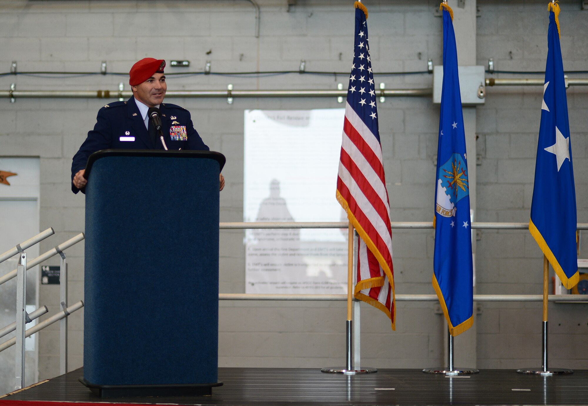 Col. Matthew "Wolfe" Davidson speaks to members of his wing during his assumption of command ceremony Sept. 19, 2014 at Hurlburt Field, Fla.
