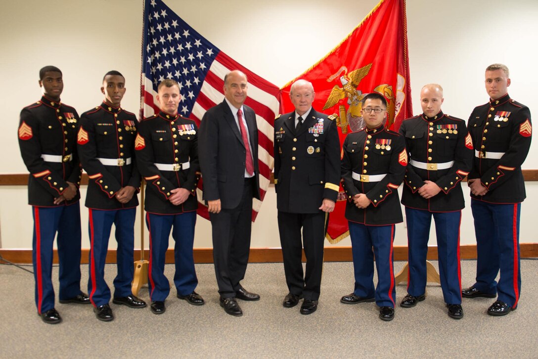 Kenneth H. Merten, the U.S. Ambassador to Croatia, and U.S. Army Gen. Martin E. Dempsey, chairman of the Joint Chiefs of Staff, pose for a photo with U.S. Marines assigned to the U.S. Embassy in Zagreb, Croatia, Sept. 21, 2014. 