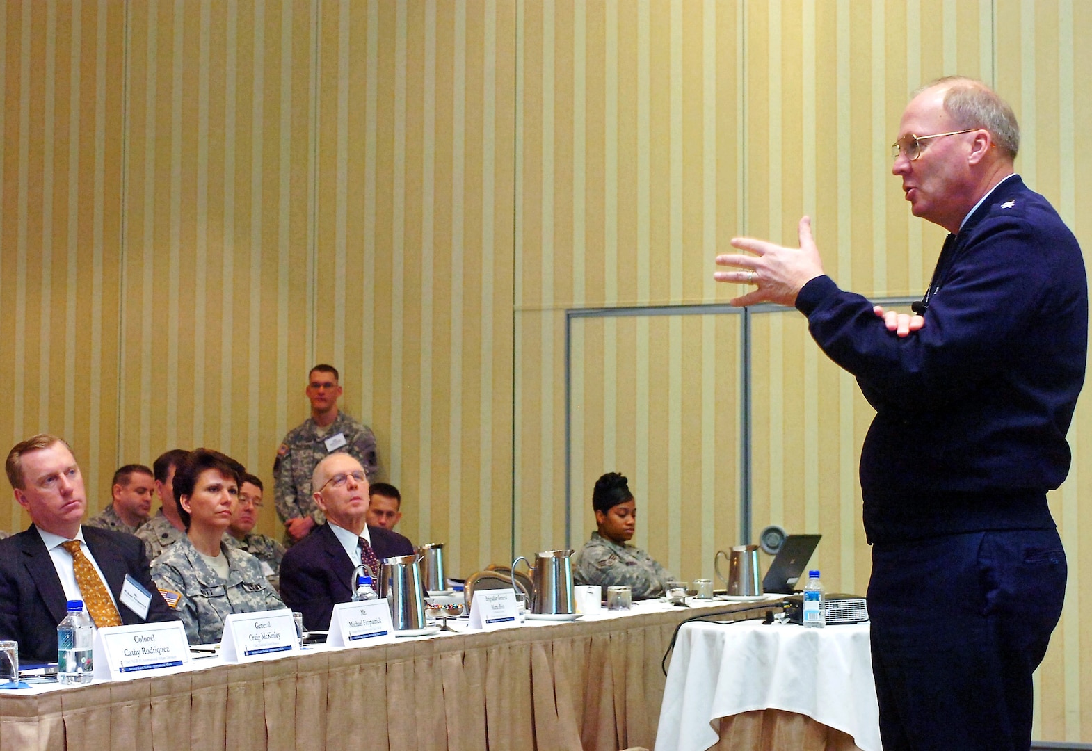 Air Force Gen. Craig R. McKinley, chief of the National Guard Bureau, addresses the State Partnership Program Workshop in Atlanta Feb. 2, 2010. Taking in his comments from the left are Michael Fitzpatrick, McKinley's foreign policy advisor; Brig. Gen. Maria Britt, Georgia Army Guard commander; and John Finney, political advisor to CNGB.