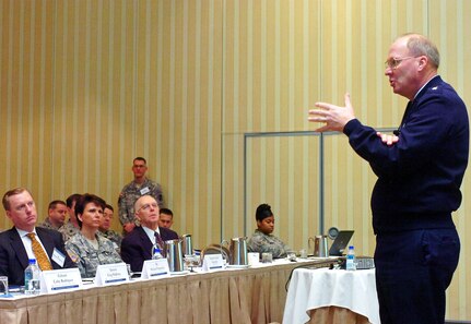 Air Force Gen. Craig R. McKinley, chief of the National Guard Bureau, addresses the State Partnership Program Workshop in Atlanta Feb. 2, 2010. Taking in his comments from the left are Michael Fitzpatrick, McKinley's foreign policy advisor; Brig. Gen. Maria Britt, Georgia Army Guard commander; and John Finney, political advisor to CNGB.