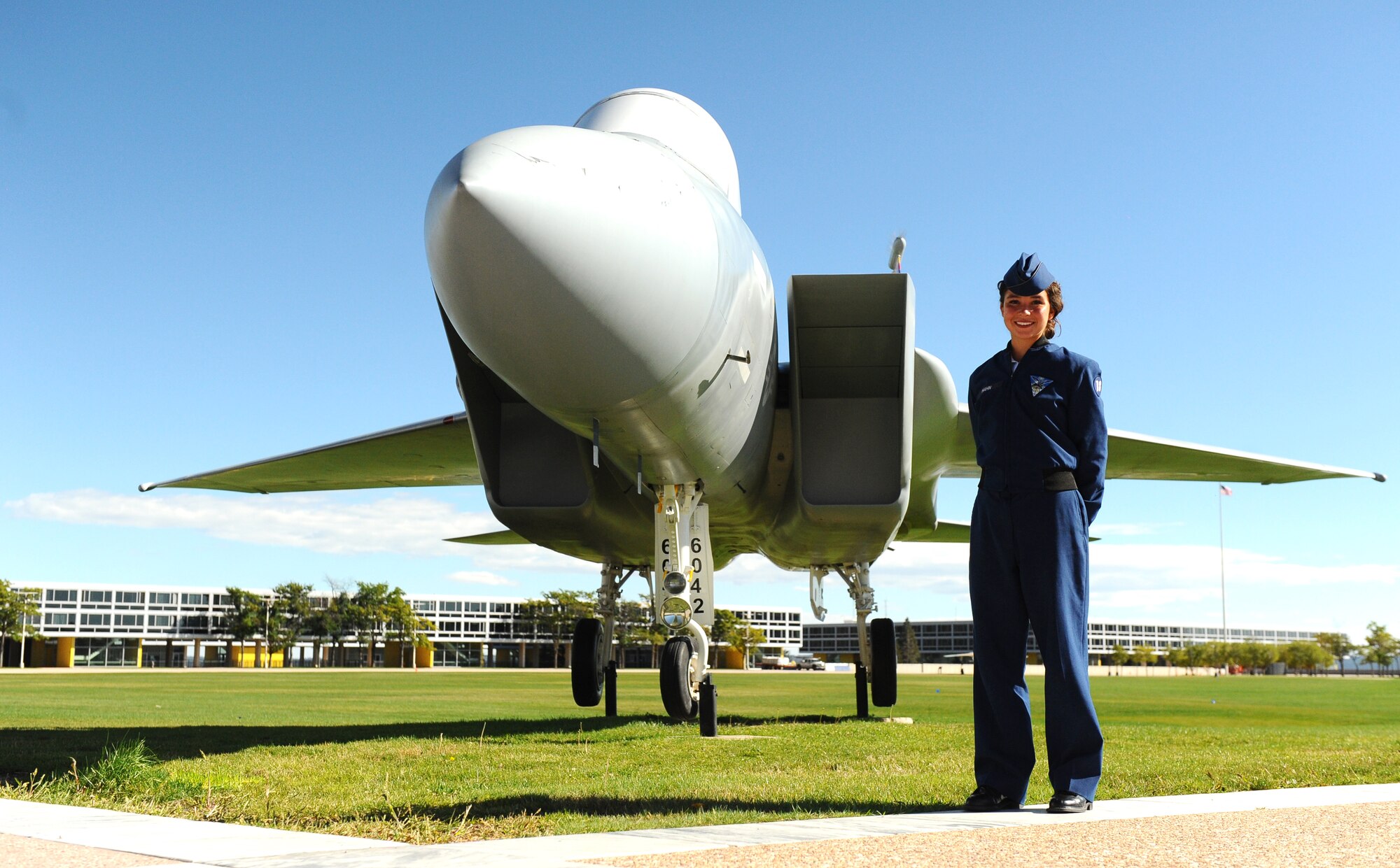 U.S. Air Force Academy Cadet 4th Class Nicole Hahn poses next to an F-15
Eagle on the Terrazzo here Sept. 23, 2014. Hahn was at the Boston Marathon
the day the bombings took place in April 2013. She chose to attend the
Academy after that experience, hoping to make a difference. (U.S. Air Force
photo/Airman 1st Class Rachel Hammes)
