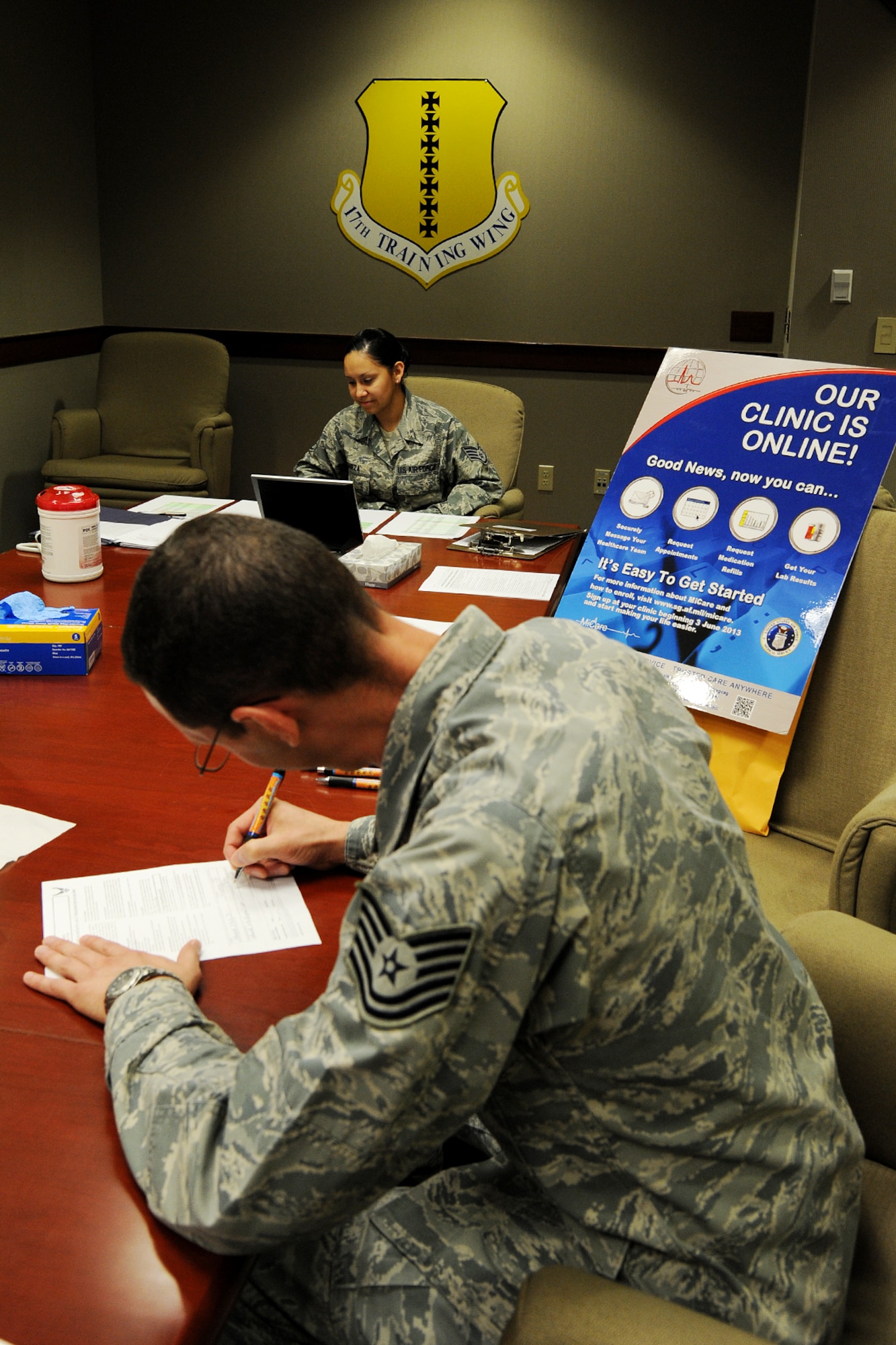 GOODFELLOW AIR FORCE BASE, Texas – Tech. Sgt. Edward J. Auty Jr., 17th Training Wing protocol, signs up for MiCare after receiving his flu vaccination by the 17th Medical Group at the Norma Brown building Sept. 23. MiCare is a confidential online healthcare messaging system that allows patients to communicate directly with their healthcare team. (U.S. Air Force photo/ Airman 1st Class Devin Boyer)
