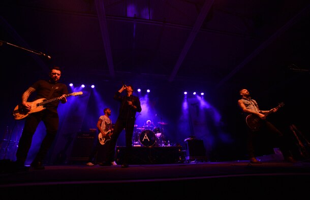 Florida-based band Anberlin plays a concert in the Skelton Memorial fitness center at Spangdahlem Air Base, Germany, Sept. 22, 2014. The free concert included a meet-and-greet session after the show.  Anberlin, formed in 2002, consists of guitarists Joseph Milligan and Cristian McAlhaney, lead vocalist Stephen Christian, bassist Deon Rexroat, and drummer Nathan Young. (U.S. Air Force photo by Airman 1st Class Kyle Gese/Released)