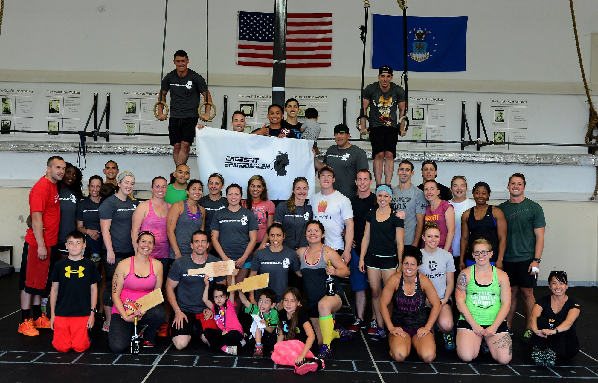 Combat Fitness Eifel Throwdown participants and their family and friends gather together at the Combat Fitness Center on Spangdahlem Air Base, Germany, Sept. 20, 2014. Throwdown contestants competed in multiple combat fitness exercises that tested their endurance, strength and speed. (U.S. Air Force photo by Airman 1st Class Luke J. Kitterman)  