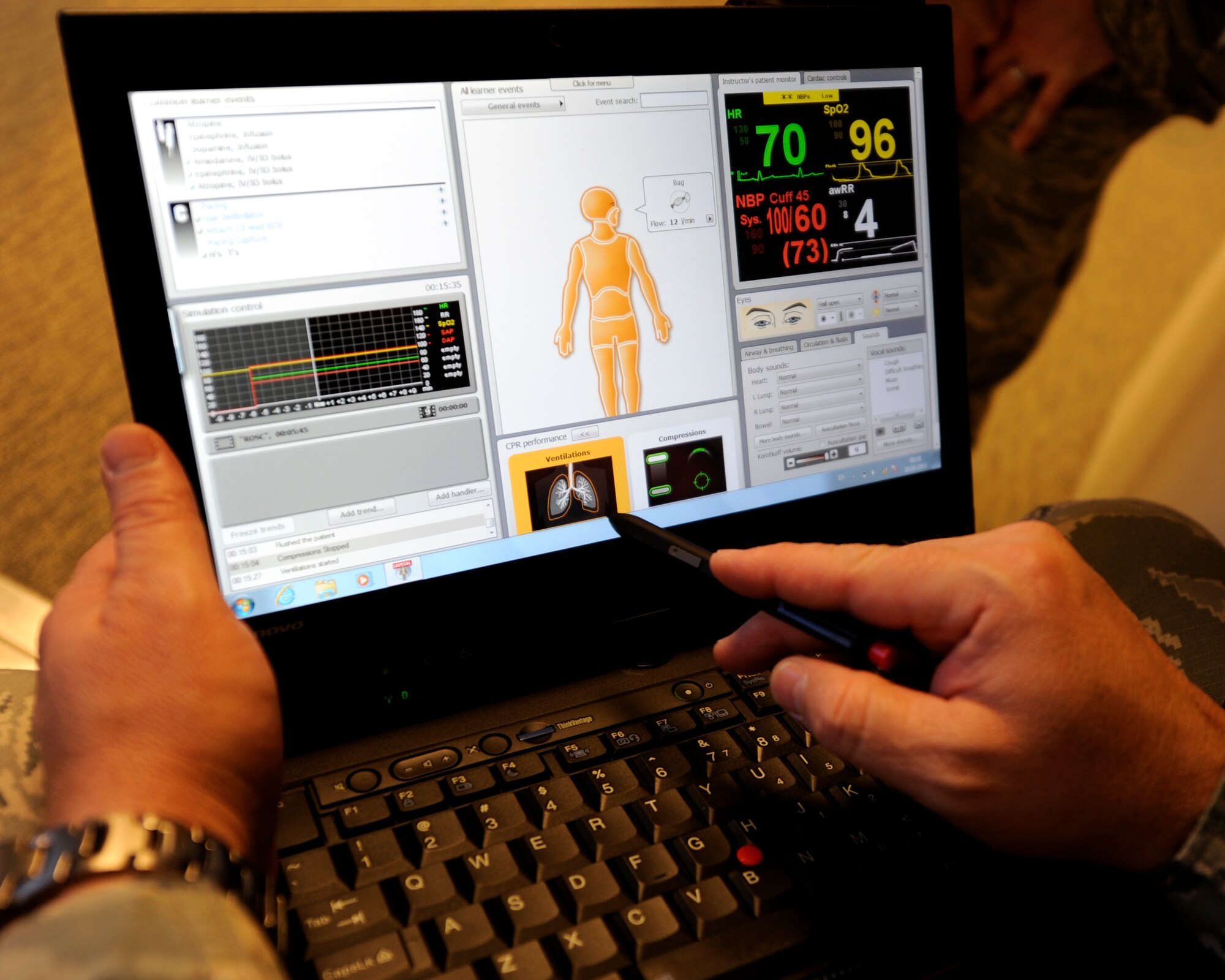 U.S. Air Force Capt. Donald Tritz, 18th Medical Group chief of education and training, operates a SimMan 3G during “Code Blue” training on Kadena Air Base, Japan, Sept. 18, 2014. The SimMan 3G is the 18th MDG’s equivalent to a flight simulator and allows medical professionals to practice with a multitude of realistic scenarios in any location. (U.S. Air Force photo by Senior Airman Marcus Morris/Released)