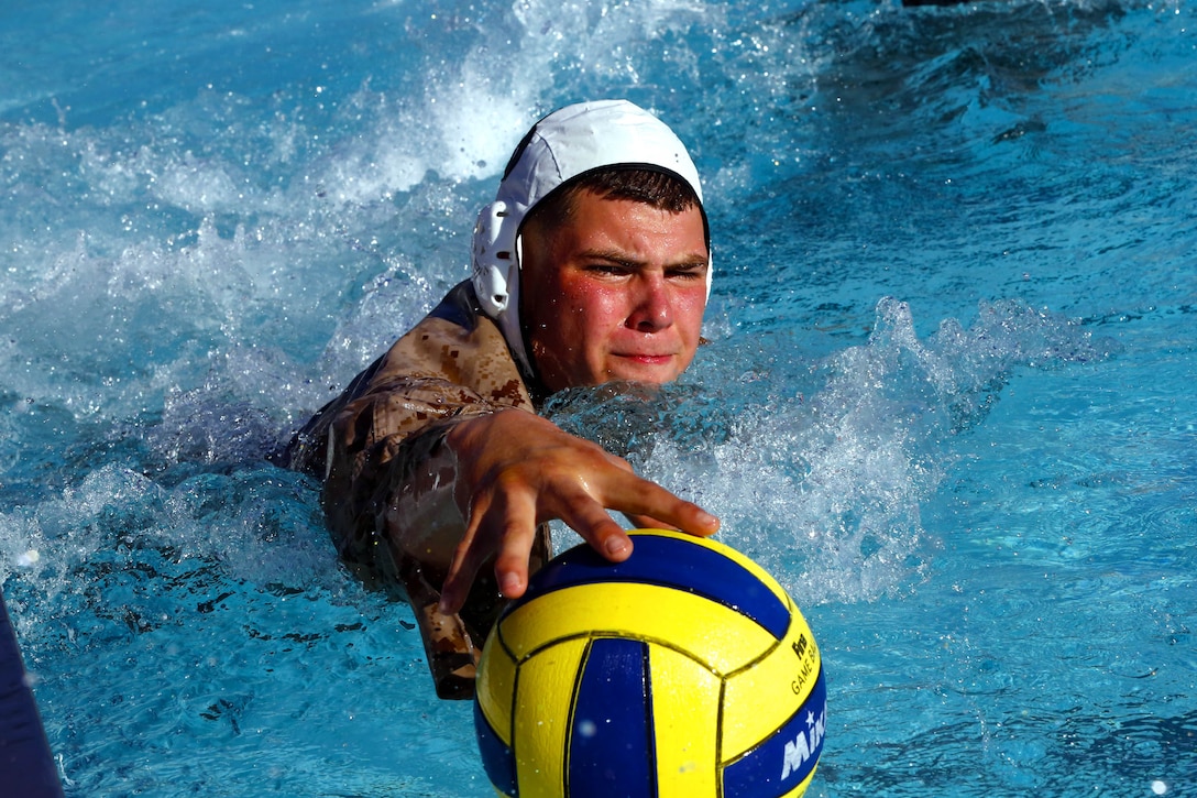 More than 50 Marines from various units came together to compete in the Combat Water Polo Tournament at the 13 Area pool, here, Sept. 24. The teams were comprised of seven to 10 Marines, each wearing boots and utilities while trying to claim first place.
