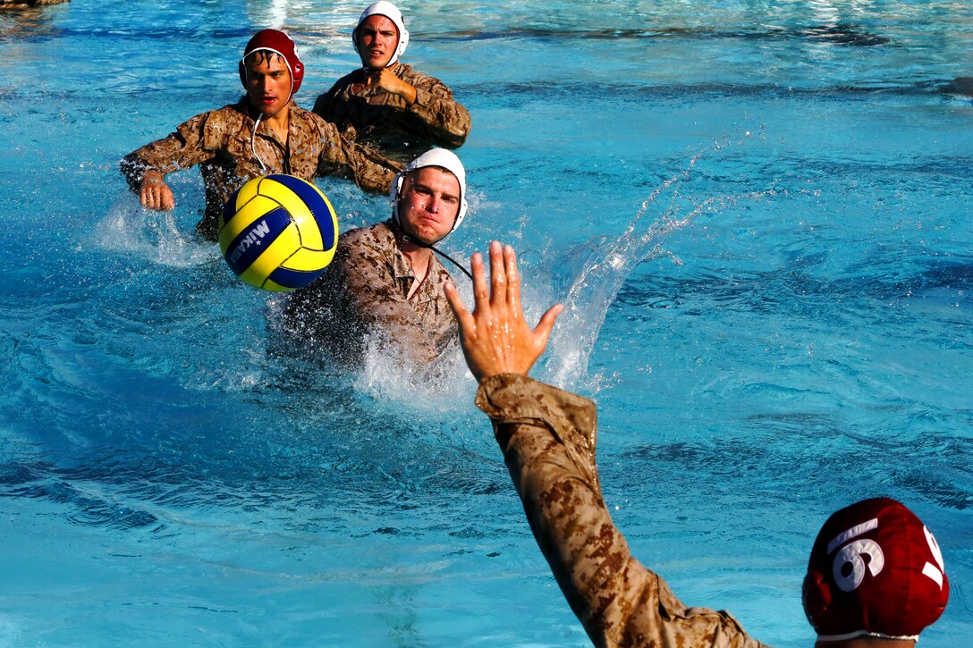 More than 50 Marines from various units came together to compete in the Combat Water Polo Tournament at the 13 Area pool, here, Sept. 24. The teams were comprised of seven to 10 Marines, each wearing boots and utilities while trying to claim first place.
