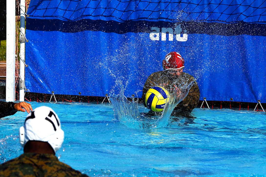 More than 50 Marines from various units came together to compete in the Combat Water Polo Tournament at the 13 Area pool, here, Sept. 24. The teams were comprised of seven to 10 Marines, each wearing boots and utilities while trying to claim first place.
