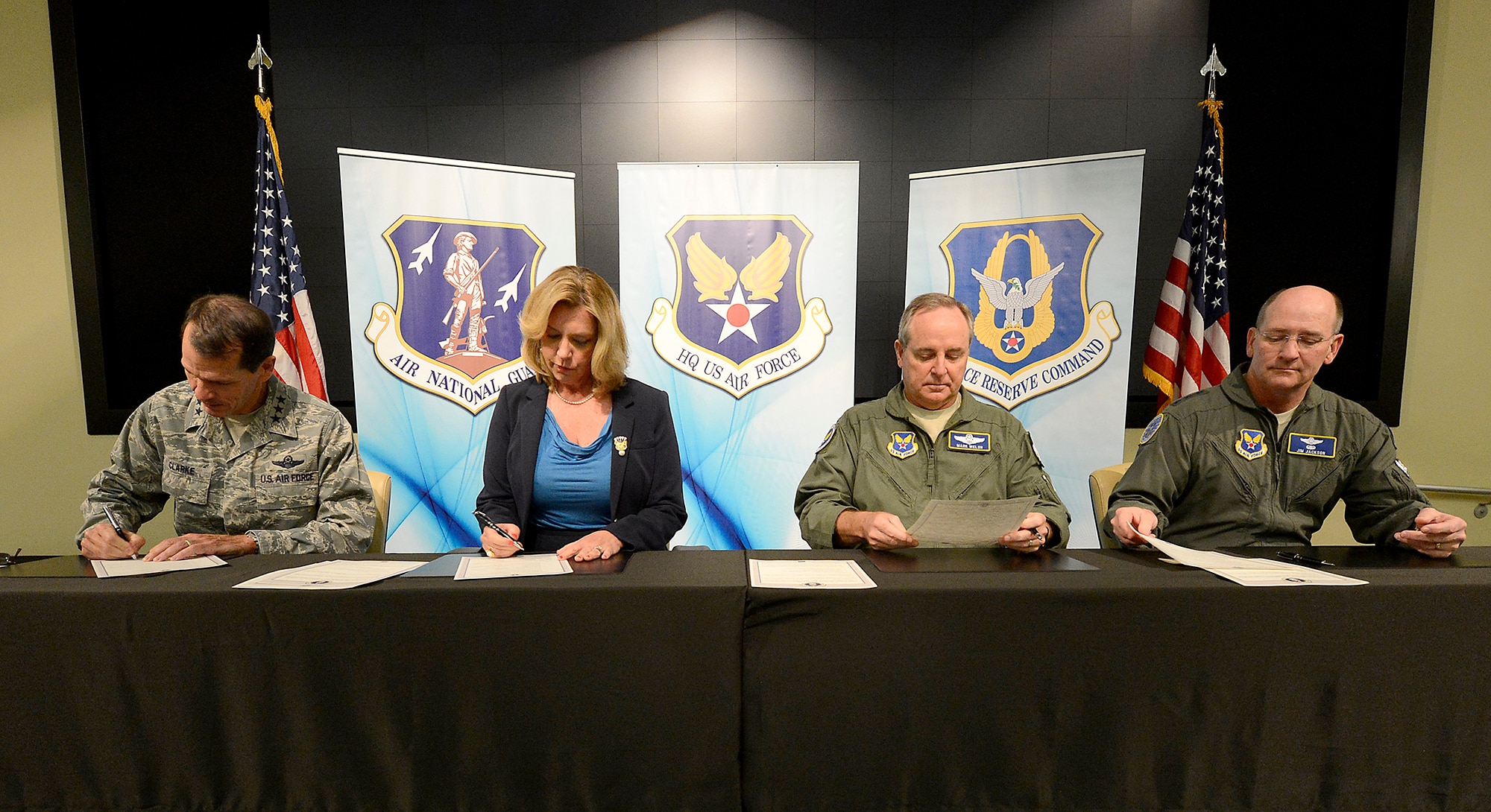 Leaders of the Air Force and the Air Reserve Component sign the Total Force Aircrew Management charter Sept. 18, 2014, during the Aircrew Summit at Joint Base Andrews, Maryland. From left to right, Director of Air National Guard Lt. Gen. Stanley E. Clarke; Secretary of the Air Force Deborah Lee James; Air Force Chief of Staff Gen. Mark A. Welsh, III; and Chief of Air Force Reserve Lt. Gen. James A. Jackson, prepare to sign the charter, which integrates total-force management of resources across the active duty, Guard and Reserve to maximize combat readiness. (U.S. Air Force photo/Scott Ash)