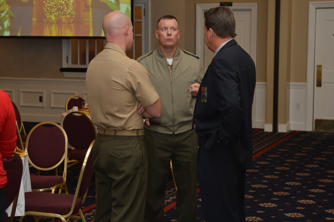 Col. David Maxwell, commander, Marine Corps Base Quantico, builds relationships with leaders in the community during his speech at his Report to the Community event at The Clubs At Quantico on September 24, 2014. 