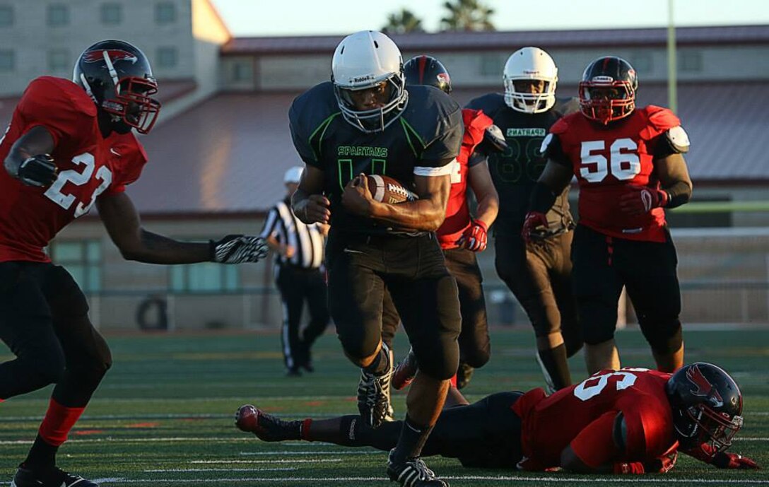 The Marine Corps Base Spartans claimed a 34-0 victory against the previously undefeated Miramar Falcons at the Paige Fieldhouse football field, Sept. 23.  Each team now has a record of 3-1 after the dominant performance by the Spartans.