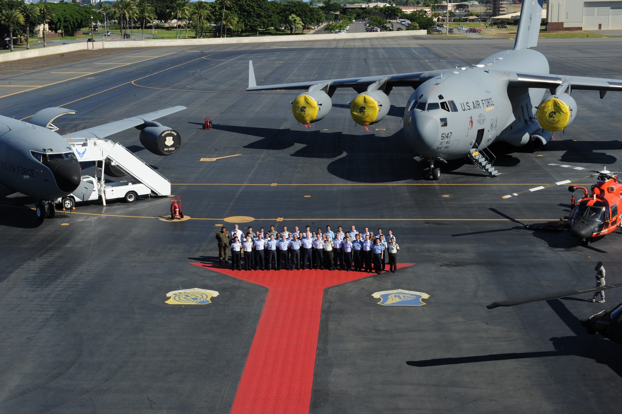 Military leaders from 20 countries pose for a group photo Sept. 23, 2014, at Joint Base Pearl Harbor-Hickam, Hawaii, during the 2014 Pacific Rim Airpower Symposium. The symposium is designed to encourage relationship building and sets the stage for interoperability in other events such as exercises, humanitarian assistance and disaster relief operations. (U.S. Air Force photo/Master Sgt. Matthew McGovern)