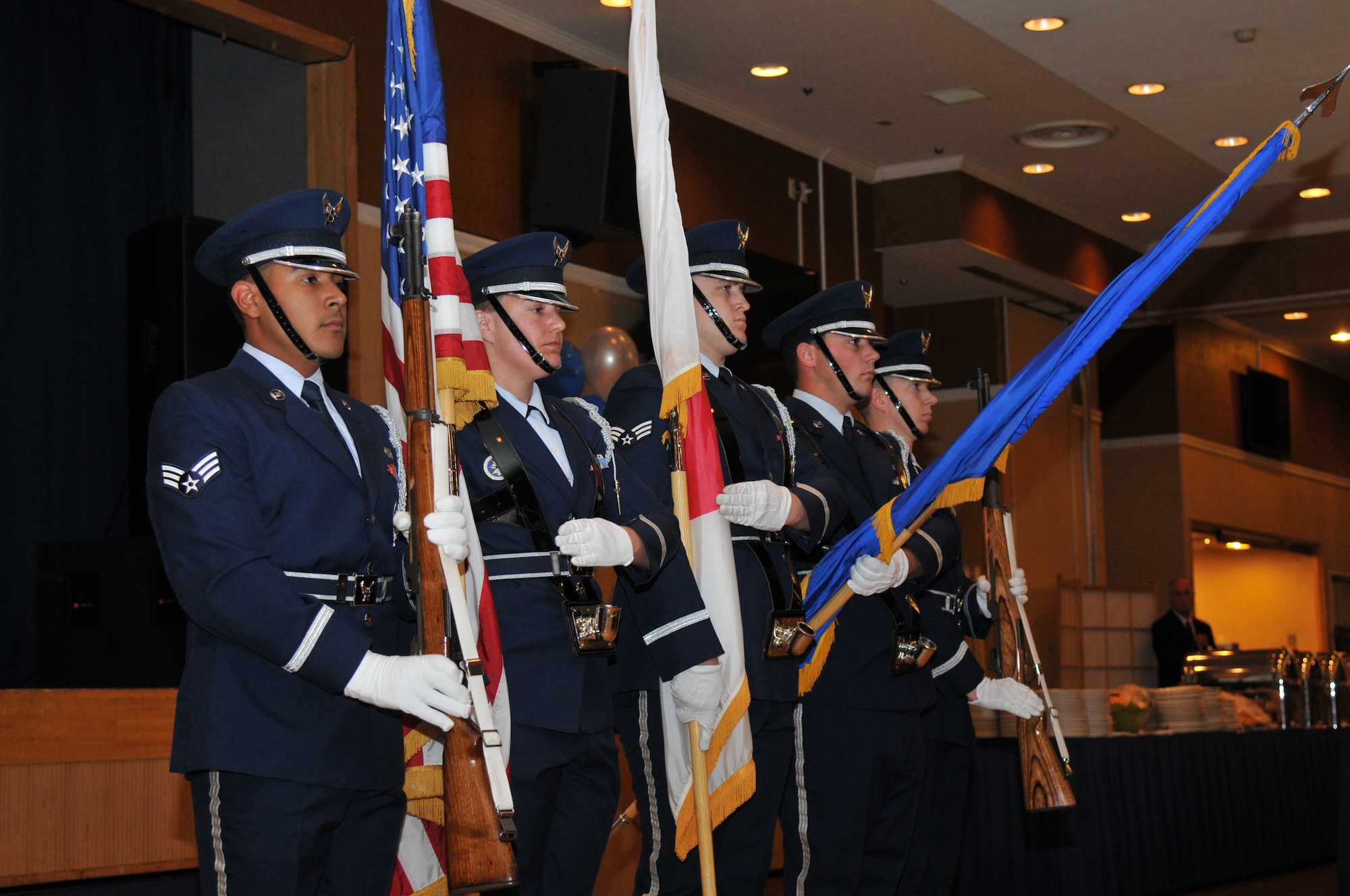 Members of the local Honor Guard present the colors during the 67th Annual Air Force Ball at Misawa Air Base, Japan, Sept. 20, 2014. Attendees at the ball included members of the local community, Japan Air Self Defense Forces and Navy personnel. (U.S. Air Force photo by Senior Airman Jose L. Hernandez-Domitilo/Released)
