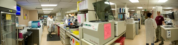 Airmen from the 99th Medical Support Squadron work in the laboratory at the Mike O’Callaghan Federal Medical Center at Nellis Air Force Base, Nev., Sept. 16, 2014. The laboratory has eight departments that include chemistry, hematology, microbiology, and the blood bank. (U.S. Air Force photo by Airman 1st Class Rachel Loftis)