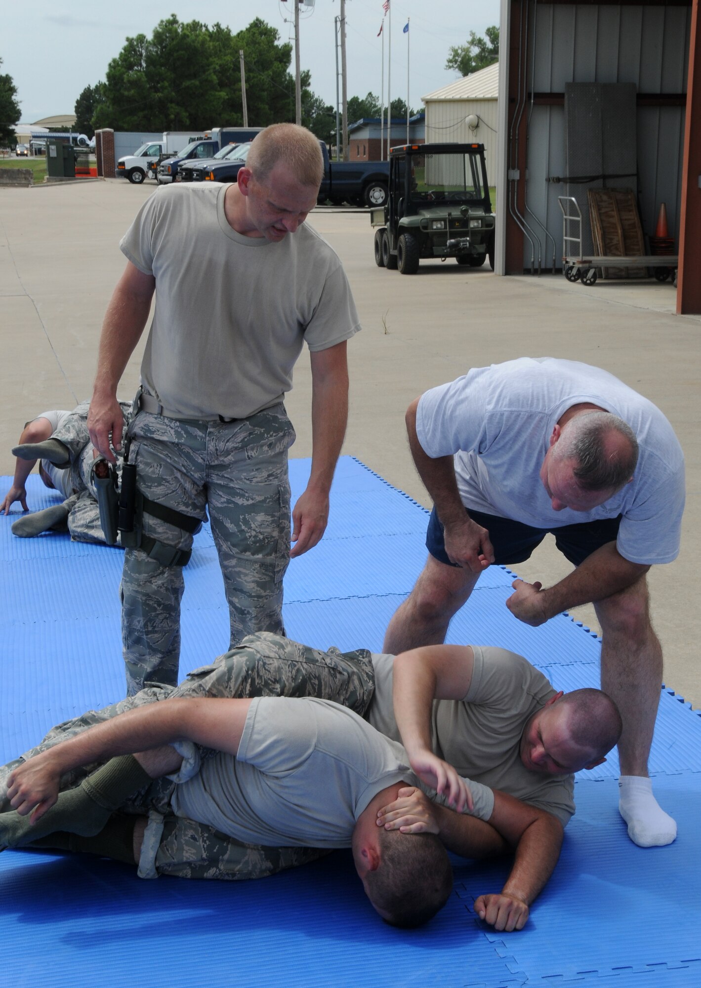 Members of the 188th Security Forces Squadron go through combative training at Ebbing Air National Guard Base, Fort Smith, Arkansas on Sept.6, 2014. (U.S. Air National Guard photo by Airman 1st Class Cody Martin/Released)