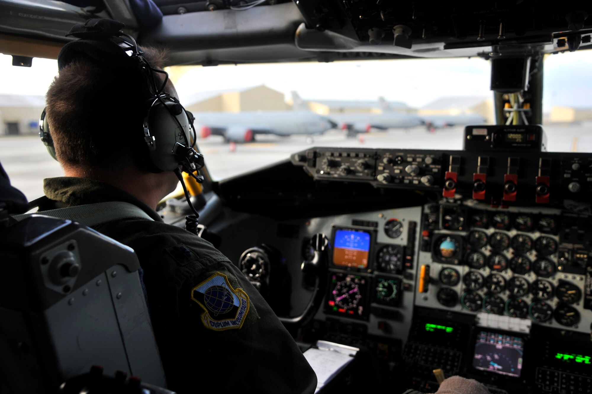 Lt. Col. David Parlotz taxis toward the runway at Fairchild Air Force Base, Washington, Sept. 23, 2014. This KC-135 Stratotanker, assigned to the 92nd Air Refueling Wing, usually transports a crew of three, including a pilot, co-pilot and boom operator. Parlotz is the 92nd ARW Inspector General. (U.S. Air Force photo by Senior Airman Mary O'Dell/Released)