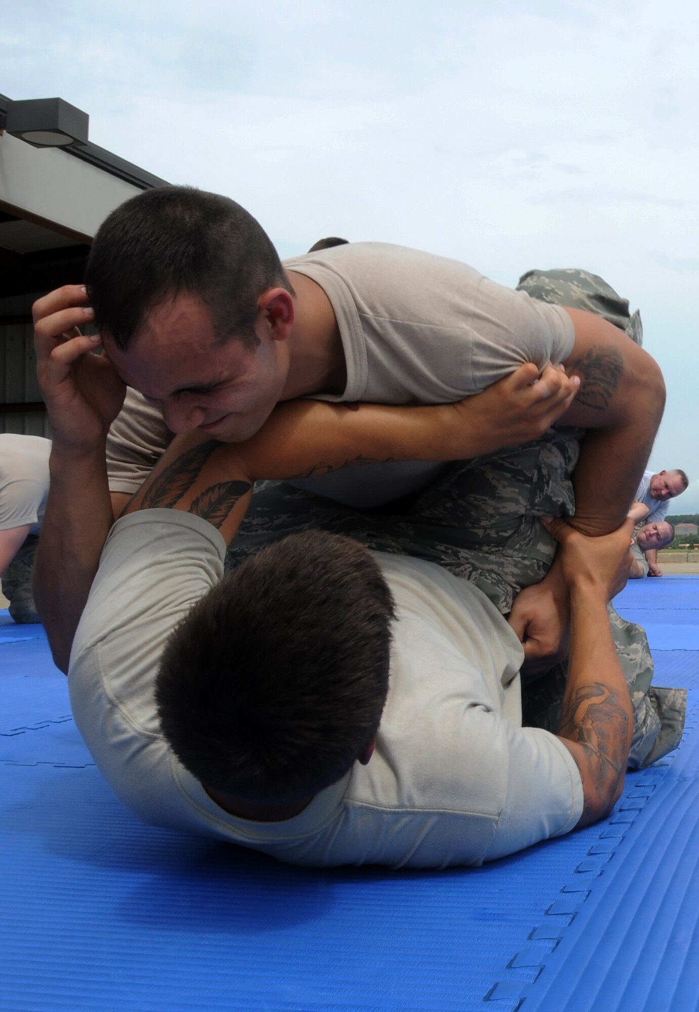 Members of the 188th Security Forces Squadron go through combative training at Ebbing Air National Guard Base, Fort Smith, Arkansas on Sept. 6, 2014. (U.S. Air National Guard photo by Airman 1st Class Cody Martin/Released)