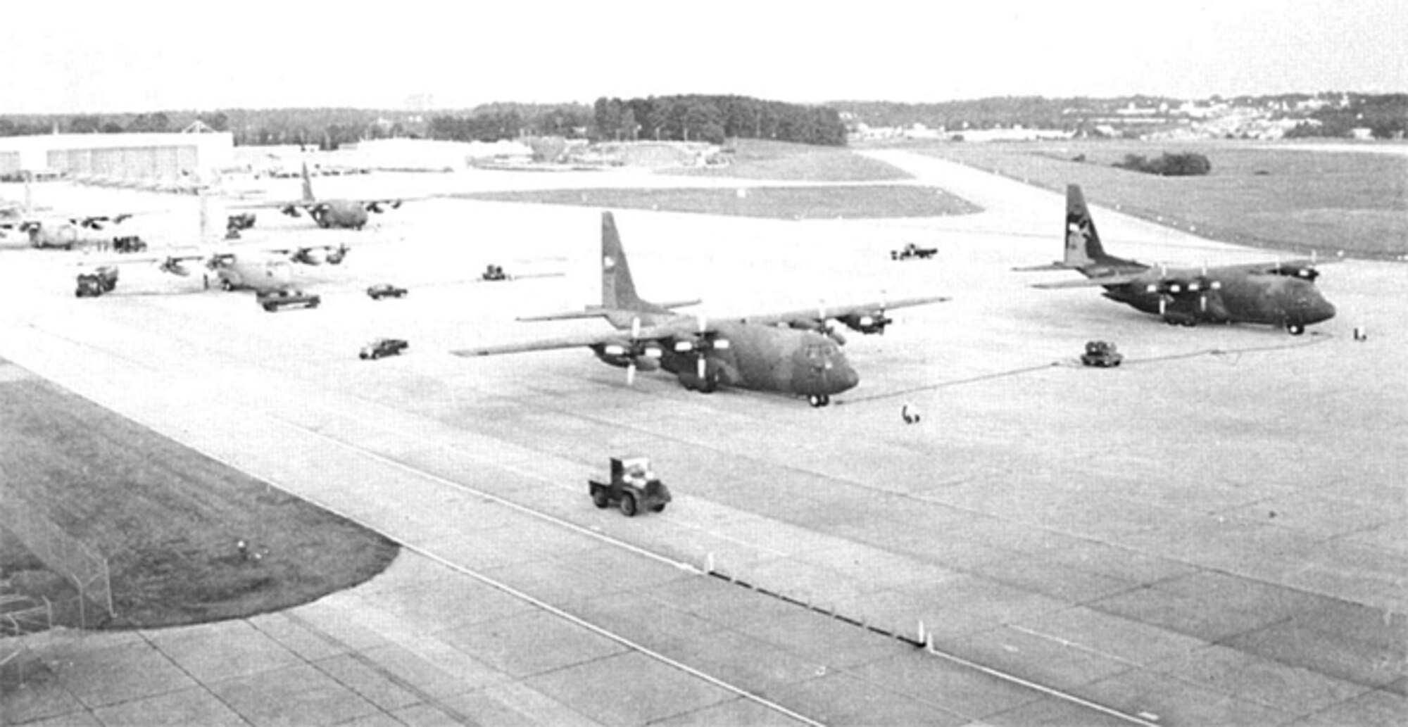 94th Airlift Wing C-130s sit loaded and prepared to leave at a moment's notice Sept. 1994. Last-minute diplomacy stopped short a planned invasion of Haiti on Sept. 19 that had the wing playing a role. (U.S. Air Force photo/Airman 1st Class Sandra Donovan)
