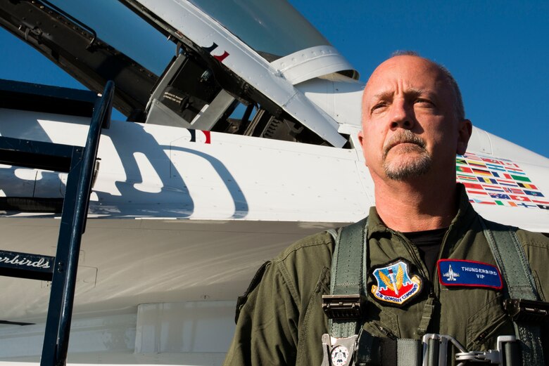 Sergeant David Cavanaugh, Boise police officer, stands in front of a U.S. Air Force Thunderbird F-16 Fighting Falcon before take-off Sept. 19, 2014, at Mountain Home Air Force Base, Idaho. Cavanaugh was responsible for creating and implementing the Boise Police Crisis Intervention Team and the Boise Police Veterans Intercept Model, programs designed to keep veterans from self-harm and jail. (U.S. Air Force photo by Airman 1st Class Malissa Lott/RELEASED)