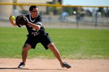 Bill Liquori, Schriever’s short stop, throws to first base during the second annual chiefs-eagles softball challenge Sept. 19, 2014 at Schriever Air Force Base, Colo. (U.S. Air Force photo/Dennis Rogers)