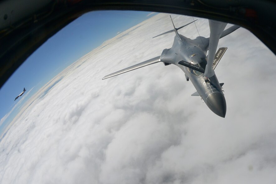 A B-1B Lancer, receives fuel from a KC-135 Stratotanker assigned to Fairchild Air Force Base over South Dakota, Sept. 23, 2014. During the flight, the crew performed training procedures with two B-1B's. The B-1B's are assigned to Ellsworth Air Force Base, South Dakota. (U.S. Air Force photo/Airman 1st Class Janelle Patiño)