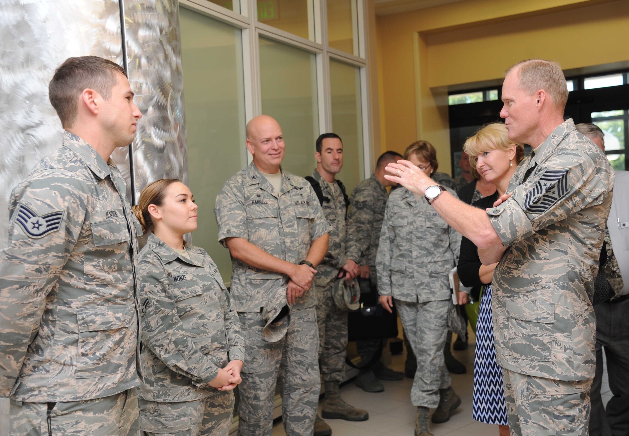 Chief Master Sgt. of the Air Force James A. Cody, right, and his wife, retired Chief Master Sgt. Athena Cody, ask questions of Staff Sgt. Stephen Jensen, Airman 1st Class Mariah Monzi, 81st Medical Operations Squadron, and Col. Thomas Harrell, 81st Medical Group commander, as they tour the Keesler Medical Center emergency department during a two-day visit of Keesler Air Force Base, Miss., Sept. 22-23, 2014. The purpose of the visit was to thank Team Keesler and further understand the various missions here, including 2nd Air Force, 81st Training Wing and the 403rd Wing. (U.S. Air Force photo by Kemberly Groue)