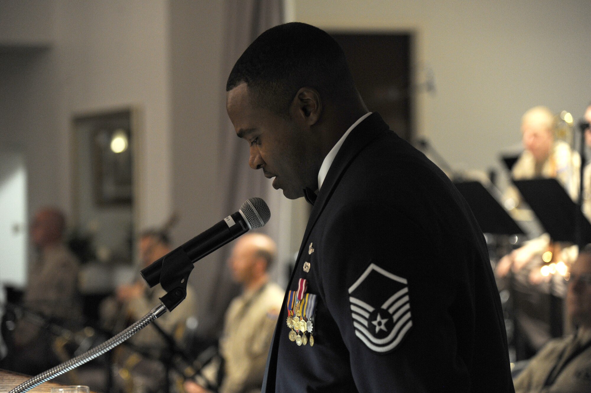 Master Sgt. David Barr, Jr., emcees during the Air Force District of Washington Air Force Birthday Ball at Joint Base Anacostia-Bolling, Washington, D.C., Sept. 19, 2014. Barr is the 811th Operations Group program manager and a UH-1N Huey flight engineer. (U.S. Air Force photo/Master Sgt. Tammie Moore)