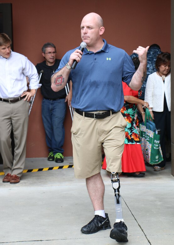 Wounded Warrior Ride Ambassador, Marine Staff Sgt. Glenn Silva, spoke about
the importance of trusting and caring for fellow service members and how
crucial good morale is for any unit or organization during Naval Health
Clinic Charleston's Multicultural Command Picnic Sept. 19, 2014, at NHCC on Joint Base Charleston, S.C. (U.S. Navy photo/Seaman Cody Meeks)
