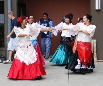 The Hiyasmin Philippine Cultural Dance Group performs during Naval
Health Clinic Charleston's Multicultural Command Picnic Sept. 19, 2014, at the
clinic grounds on Joint Base Charleston, S.C. (U.S. Navy photo/ Seaman Cody Meeks)
