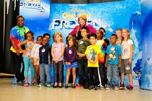 Children of U.S. Service members meet with a Disney character at the Bethel Manor Youth Center in Hampton, Va., Sept. 23, 2014. The children also had a chance to build a snowman while the performers came to visit. (U.S. Air Force photo by Airman 1st Class Breonna Veal) 
