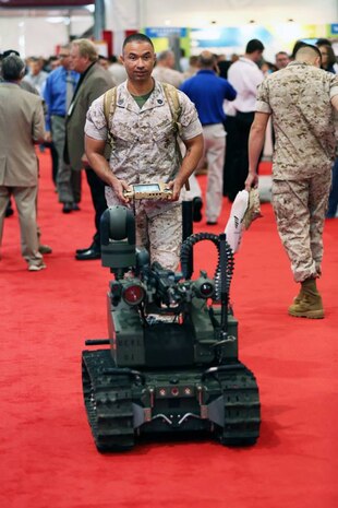 GySgt. Joe Perrera takes the Modular Advanced Armed Robotic System (MAARS) for a stroll (or maybe a roll) during Modern Day Marine.