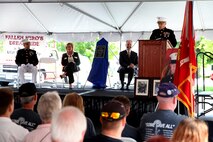 COTTLEVILLE, MO – Col. Jason L. Morris speaks during a dedication ceremony for the Cottleville Post Office in memory of Lance Cpl. Phillip Vinnedge in Cottleville Sept. 23. Health Resolution-2391 became public law on June 9, 2014. The law designated the post office building in Cottleville as the Lance Cpl. Phillip Vinnedge Post Office. The bill was introduced on June 14, 2013 and signed into law by President Barack Obama on June 9, 2014. Morris is the Commanding Officer of 9th Marine Corps District, Western Recruiting Region, Marine Corps Recruiting Command and Vinnedge’s commanding officer while deployed. (U.S. Marine Corps photo by Sgt. Erik S. Brooks Jr.)