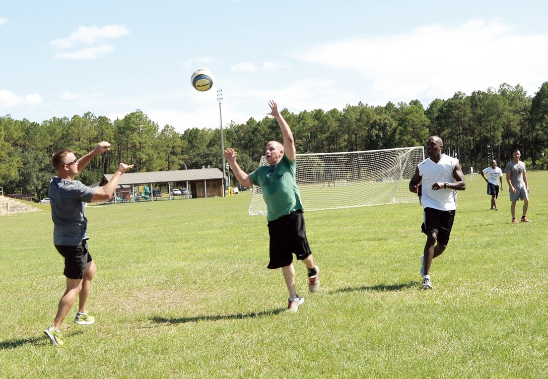 Marines work up a sweat while playing gatorball, a combination sport of football, rugby and soccer, at Boyett Park aboard Marine Corps Logistics Base Albany, Sept. 5.