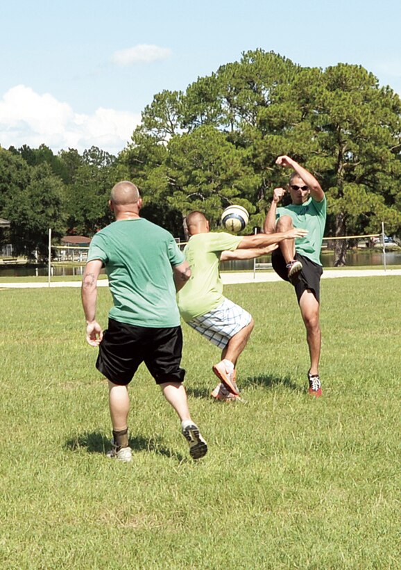 Marines work up a sweat while playing gatorball, a combination sport of football, rugby and soccer, at Boyett Park aboard Marine Corps Logistics Base Albany, Sept. 5. 