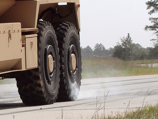 A Category II A1 Cougar Mine-Resistant, Ambush-Protected vehicle performs anti-lock braking systems inspections during operational testing on the test track, recently.