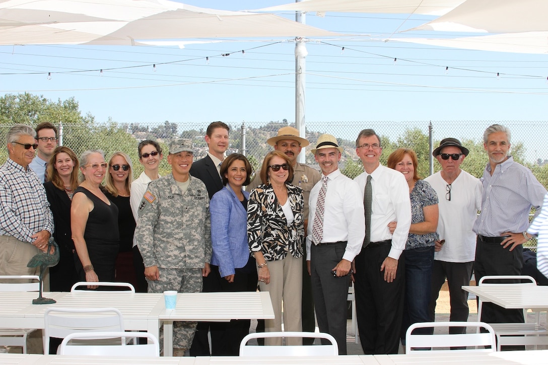The Honourable Jo-Ellen Darcy, Assistant Secretary of the Army for Civil Works, met with Friends of the Los Angeles River (FOLAR) at the Frog Spot Cafe Sep 10th to hear their vision for bringing the River back to life.
 South Pacific Division Commander BG Mark Toy and Los Angeles District staff joined Ms. Darcy on her visit. 
The Frog Spot is a cafe FOLAR opened this summer as a place to gather along the river. It's already attracted more than 5,500 visitors along with the River Rover educational van, FOLAR members explained. 
They introduced her to the FOLAR Red Legged Frog, the river's endangered mascot. LA 13th District Councilman Mitch Ferrell joined City Engineer Gary Lee Moore, Public Works Commissioner Barbara Romera, and Lewis McAdams FOLAR President on the tour.