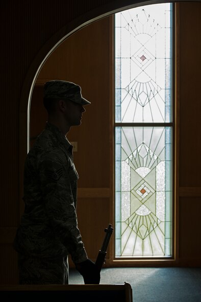 Staff Sgt. Joseph Goddard, a Team Osan honorguardsman, stands by before a Prisoners of War/Missing in Action remembrance ceremony Sept. 25, 2014, at Osan Air Base, Republic of Korea. The ceremony was in remembrance of the hundred thousands of POW/MIAs and served to acknowledge their sacrifices. (U.S. Air Force photo by Staff Sgt. Jake Barreiro/Released)