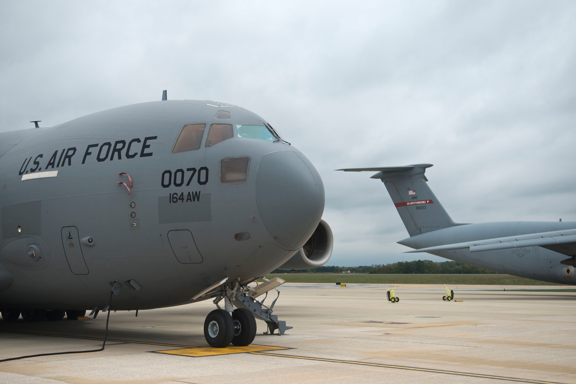 MARTINSBURG, W.Va.-- The first C-17 Globemaster III arrived at the 167th Airlift Wing in Martinsburg, W. Va. on September 25th, 2014.  The wing has flown the C-5 Galaxy since 2007 and will begin C-17 flying operations in January 2015. The last C-5 unit in the Air National Guard, the 167th began the conversion process in July and will maintain a fleet of eight C-17s. (U.S. Air National Guard photo by Tech. Sgt. Michael Dickson/Released)