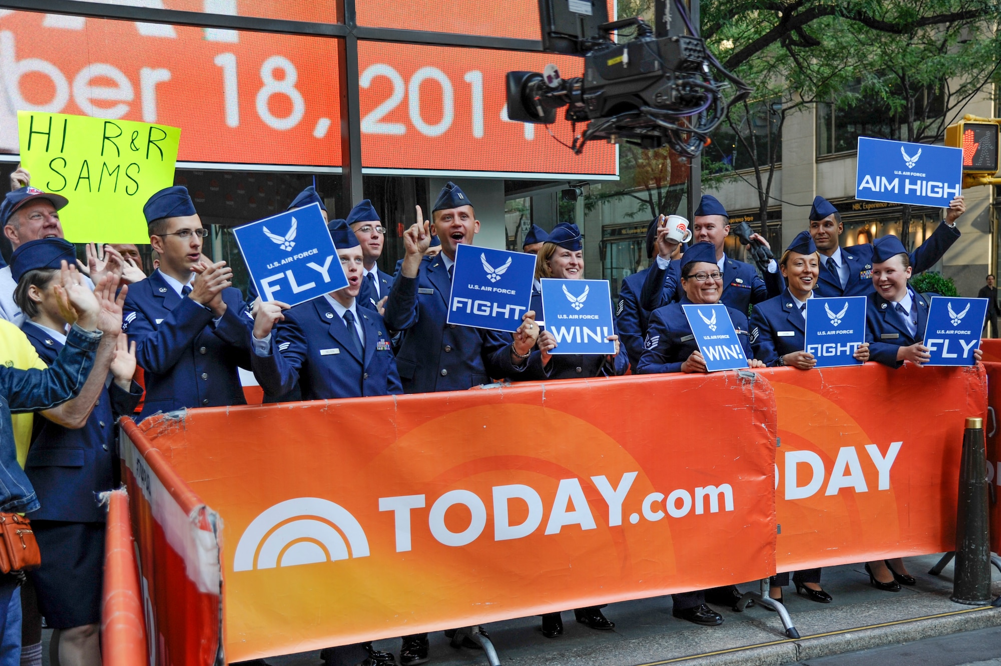 Airmen from Joint Base McGuire-Dix-Lakehurst, N.J., cheer outside a news station to show pride on the U.S. Air Force’s 67th birthday, Sept. 18, 2014, in New York. The day continued with a celebration in Bryant Park where Loree Sutton, Commissioner of Veterans’ Affairs for New York City, read a proclamation announcing Sept. 18, 2014, as New York City United States Air Force Day, by Bill de Blasio, New York City mayor. (U.S. Air Force photo by Airman 1st Class Tara A. Williamson/Released)