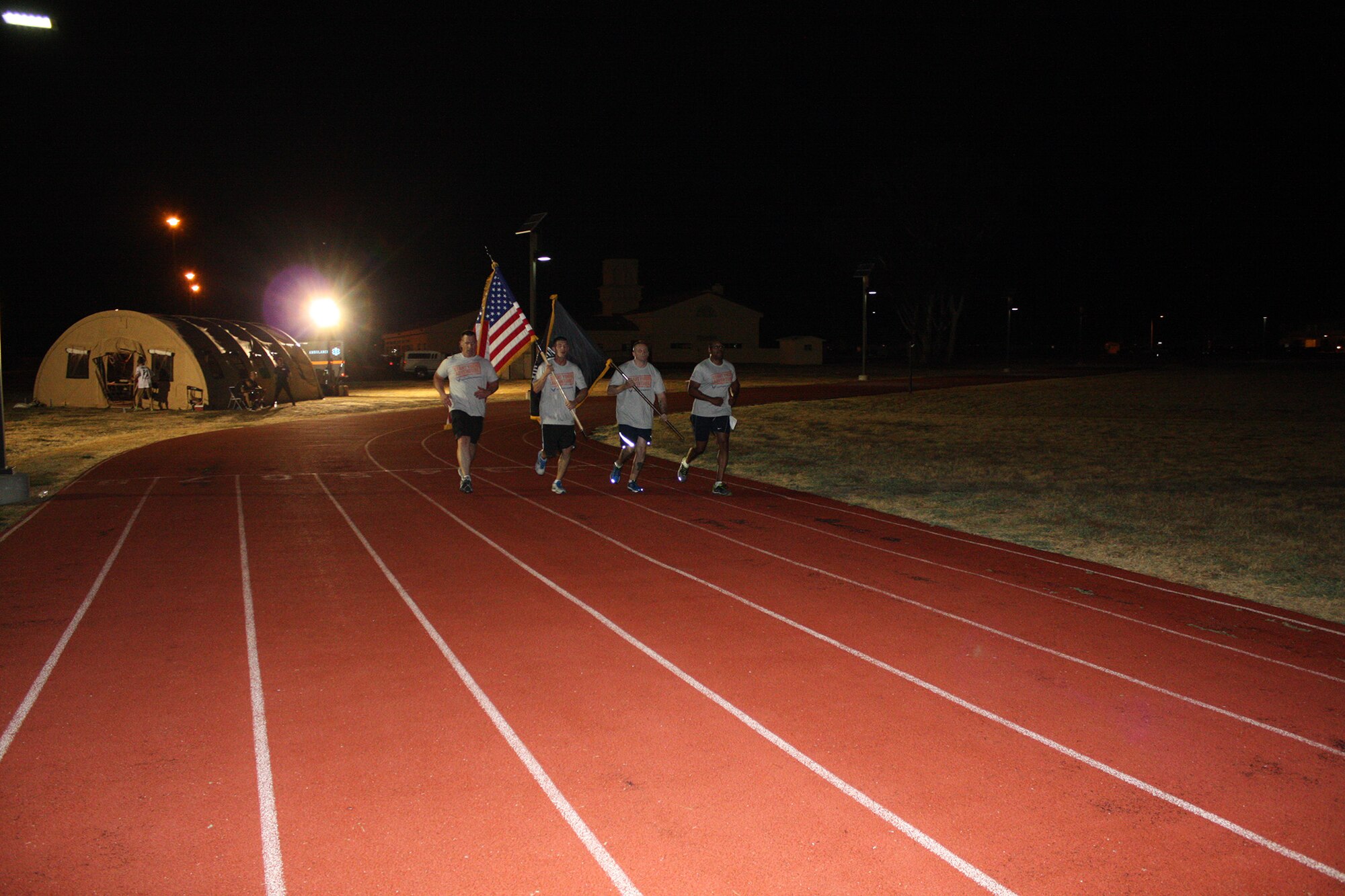 TRAVIS AIR FORCE BASE, Calif. -- The 349 AMW, recruiters, Senior Master Sgt. Alex Brown, Tech. Sgt. Robert Thames, Tech. Sgt. William Pullion, and Tech. Sgt. Jeffrey Madden honor our Prisoners of War and Missing in Action by participating a 24 hour run, Sept 18-19. (courtesy photo) 